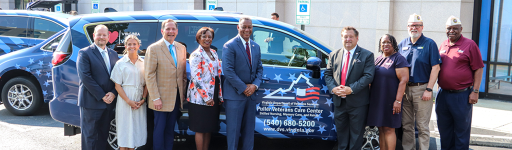 Team in front of donated van from DAV for care centers