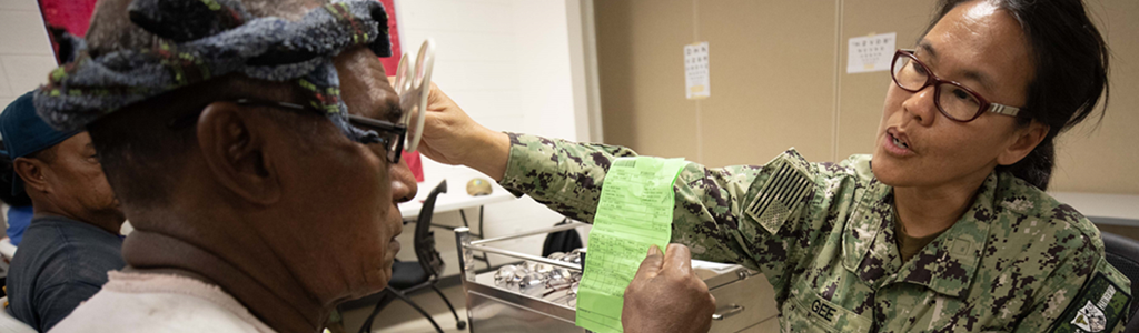 Optometrist checking a veteran's vision